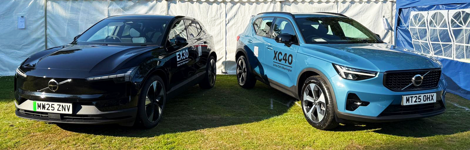 Volvo Cars Warrington Disability Awareness Day 2025 Banner Image. Black EX30 and blue XC40