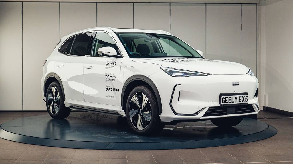 Geely EX5 Exterior - With a white paint finish showcasing the front three quarters of the vehicle with it sitting on a turntable.