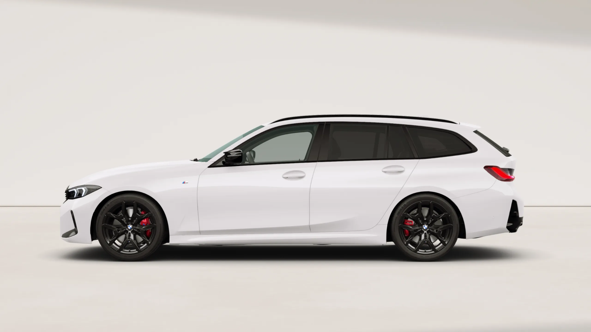 M340i xDrive Black Edition Touring side