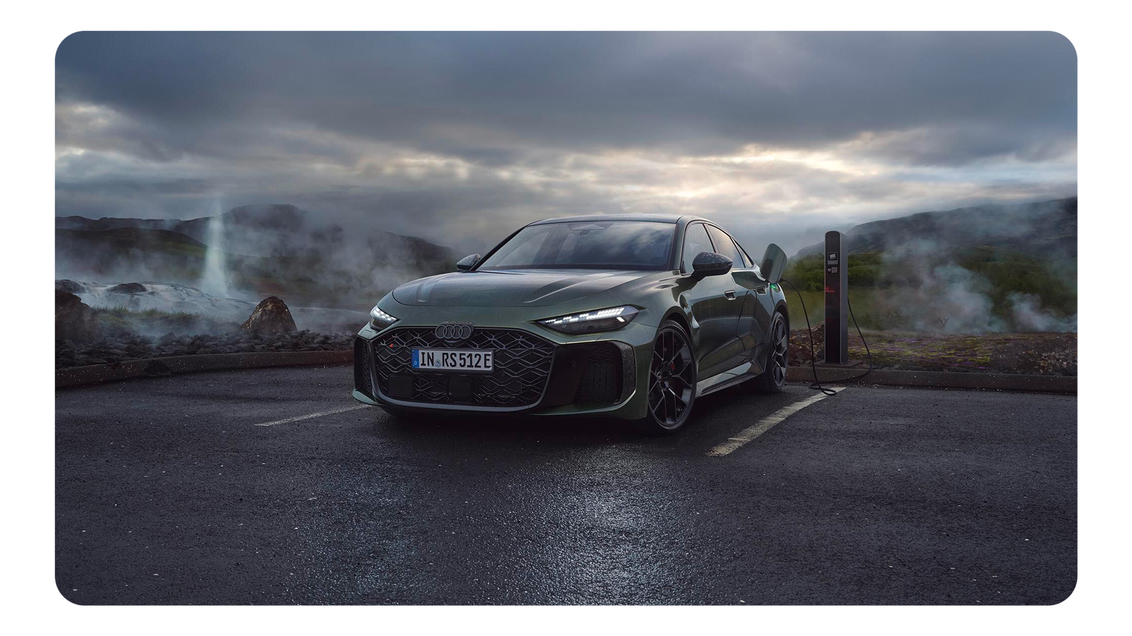 RS 5 Saloon parked with a charger plugged in.