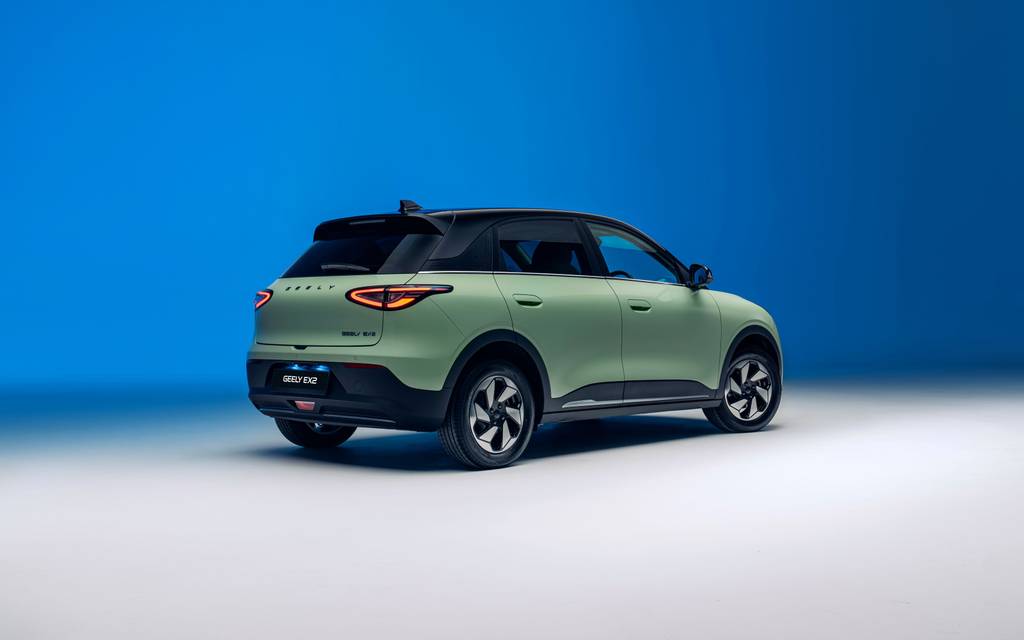 Geely EX2 Rear three quarters in green with a blue gradient background