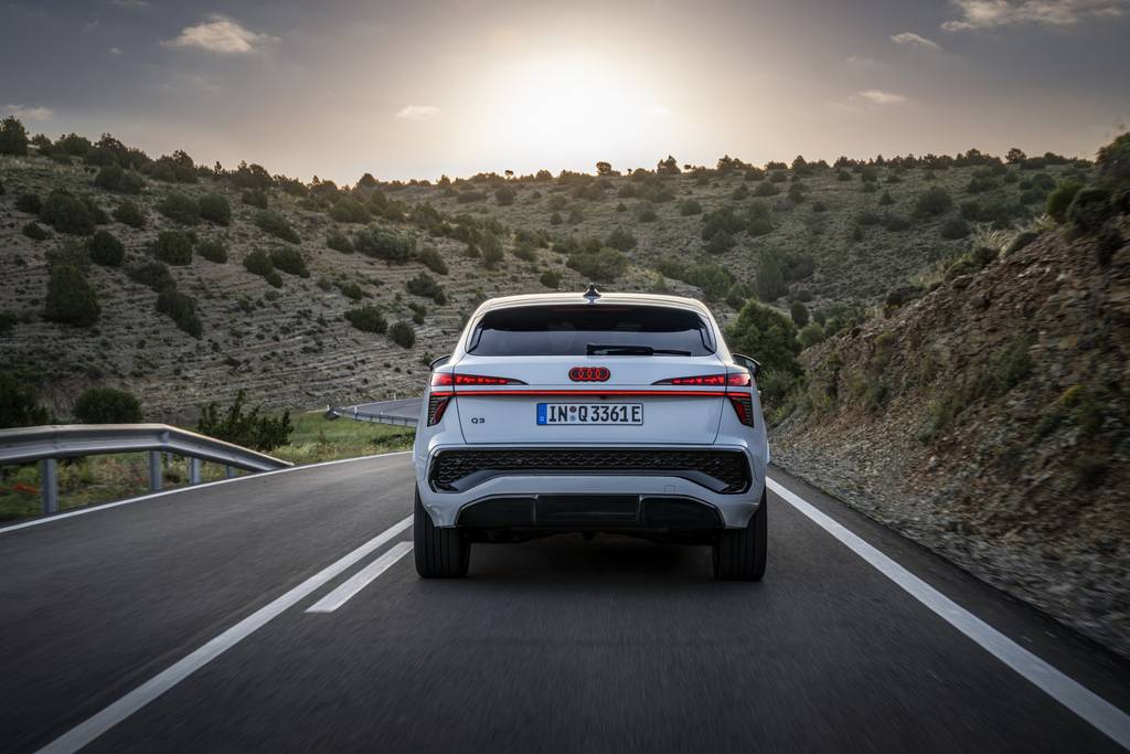 q3-sb-e-hybrid-rear-view-driving