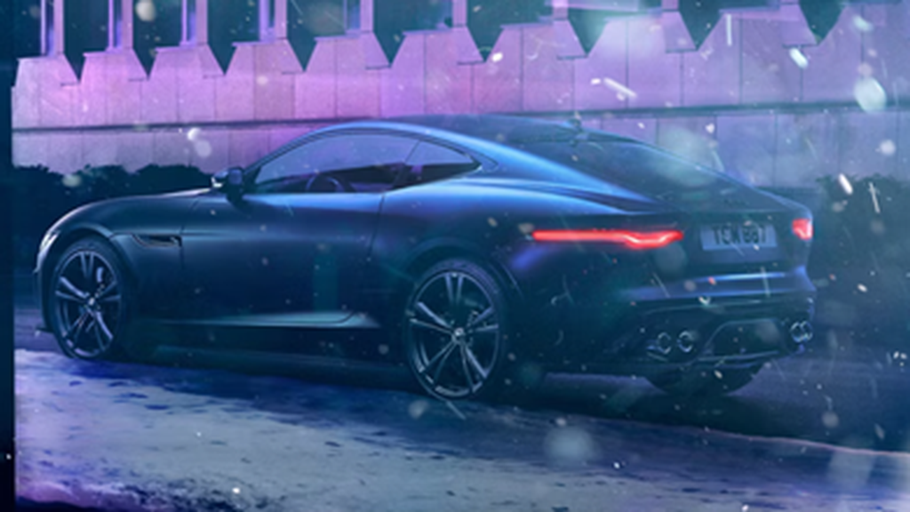 A picture of a Jaguar in the snow.