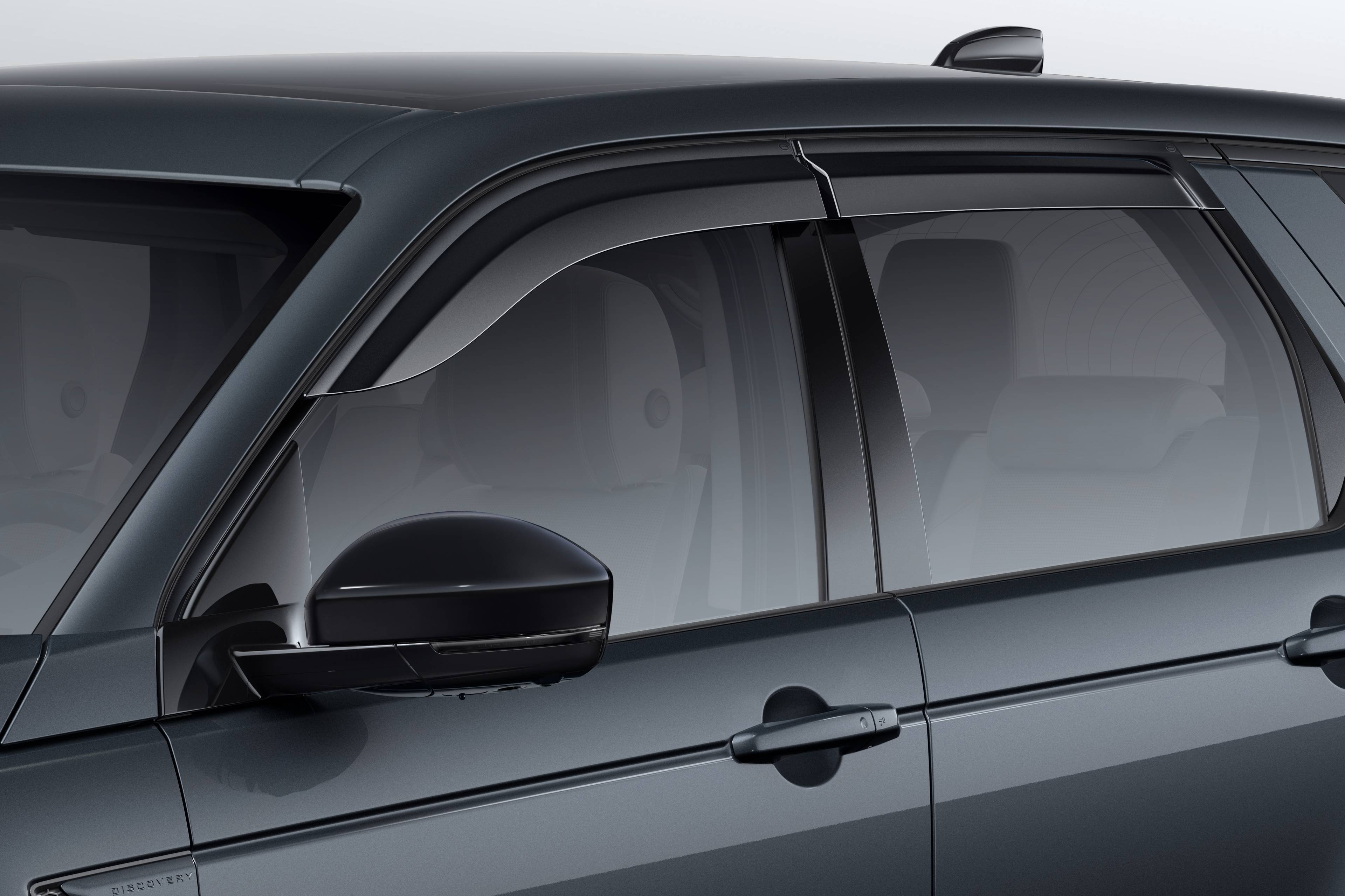 close up image of the side of a discovery sport and its wind deflectors