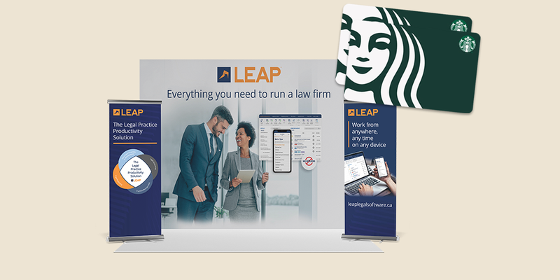 LEAP booth with banners and starbucks gift card