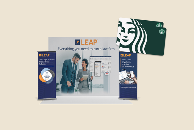LEAP booth with banners and starbucks gift card
