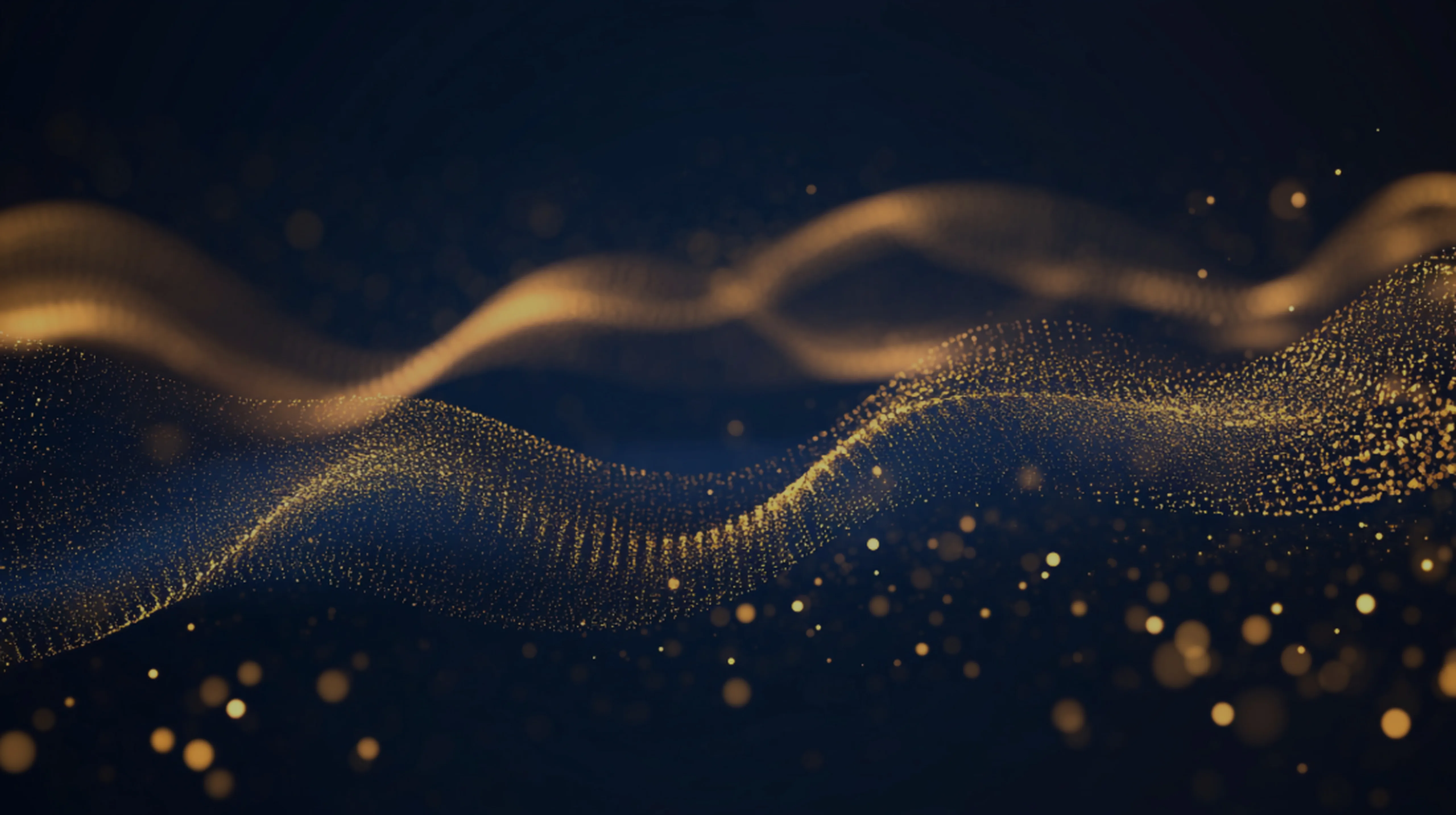 waves of golden specs in unison against a black and deep blue background