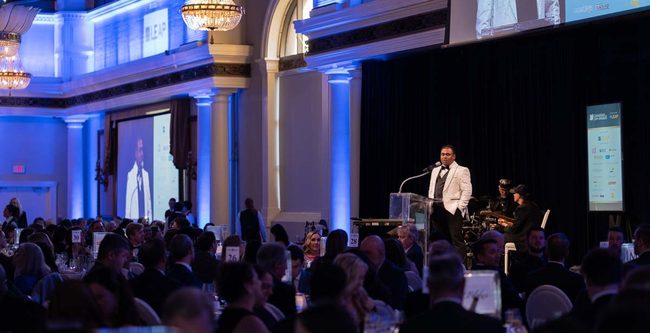 person addressing a crowd