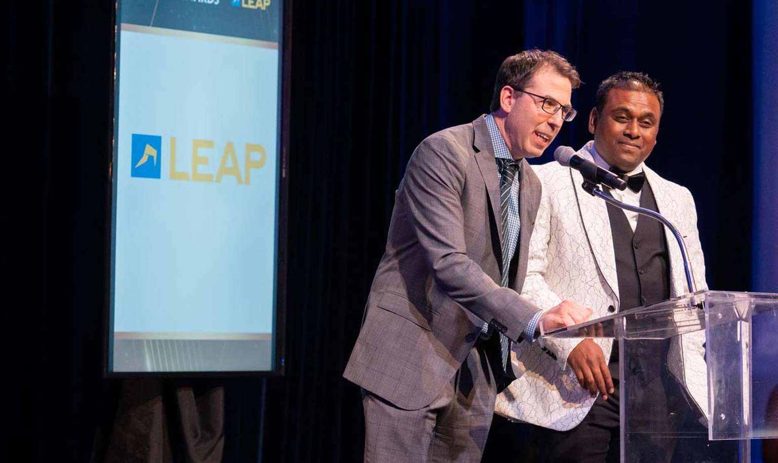 2 people on stage