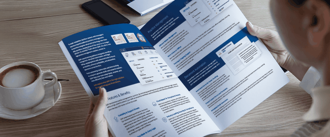 Person reading LEAP's mid to large firm brochure.