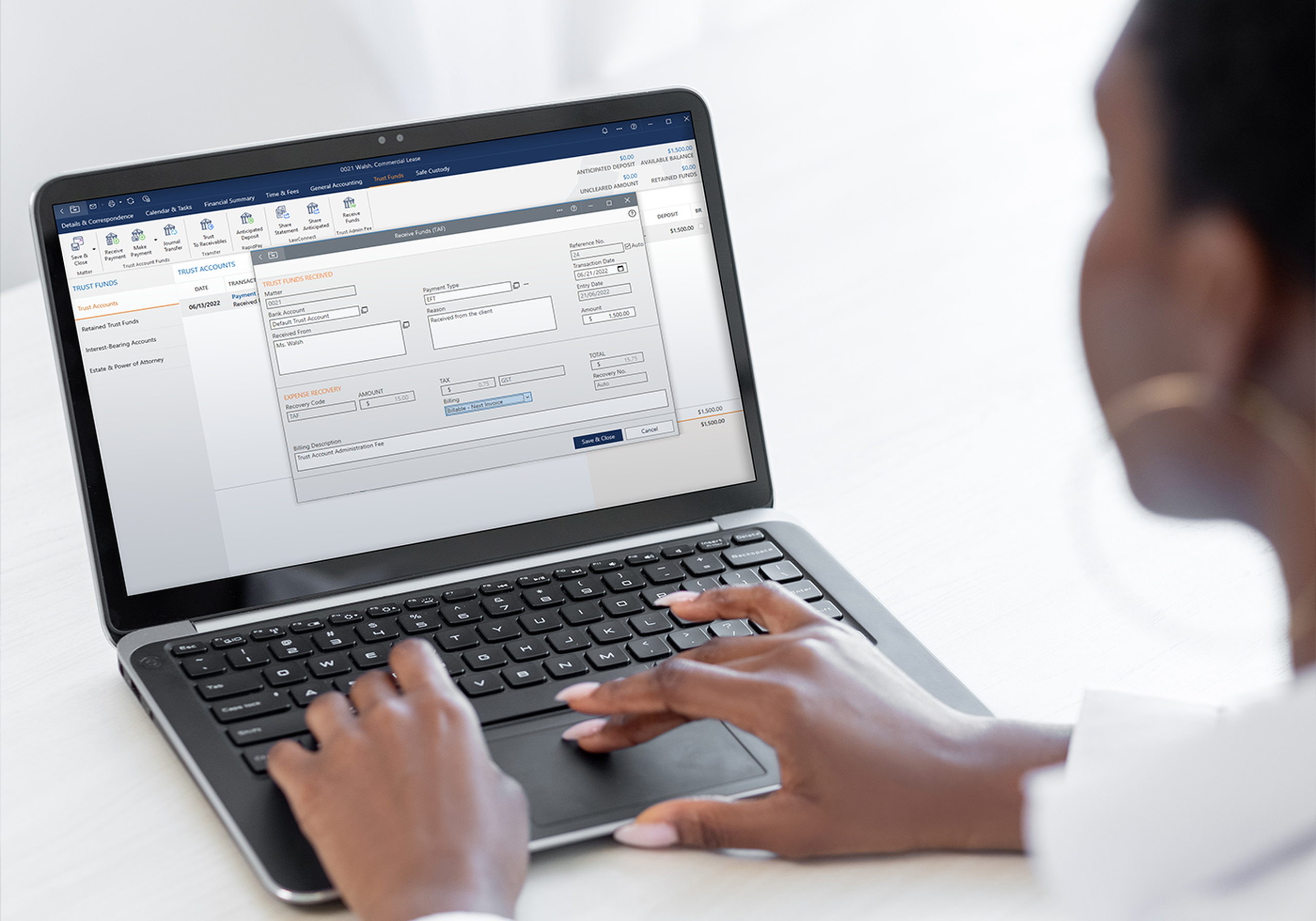 Person typing on a laptop