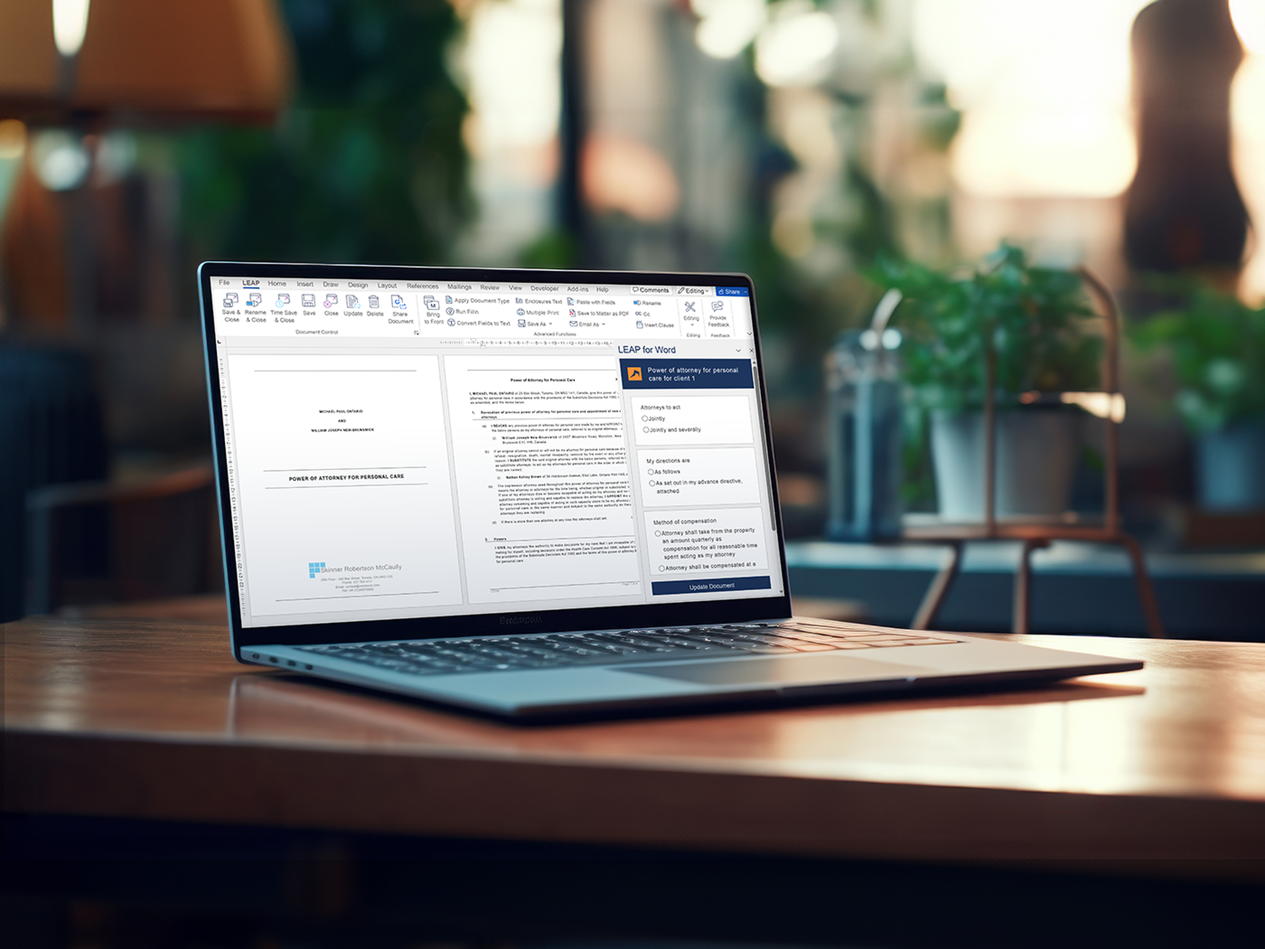 laptop on desk with LEAP app open