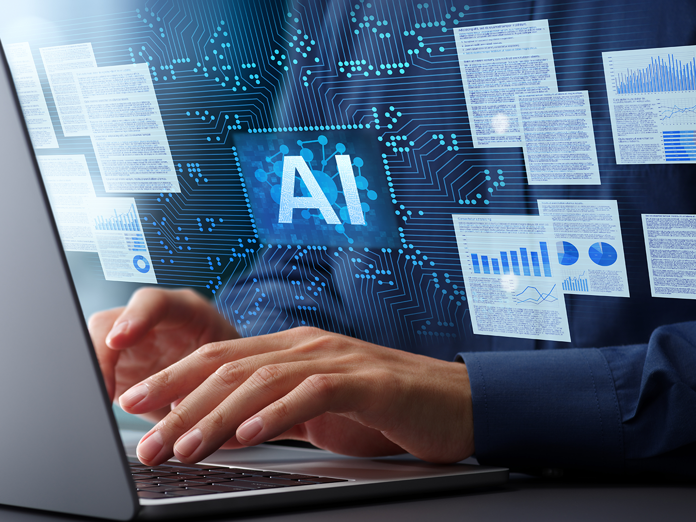 Hands typing on a laptop with floating digital documents and an AI symbol on a circuit background, symbolizing artificial intelligence technology.