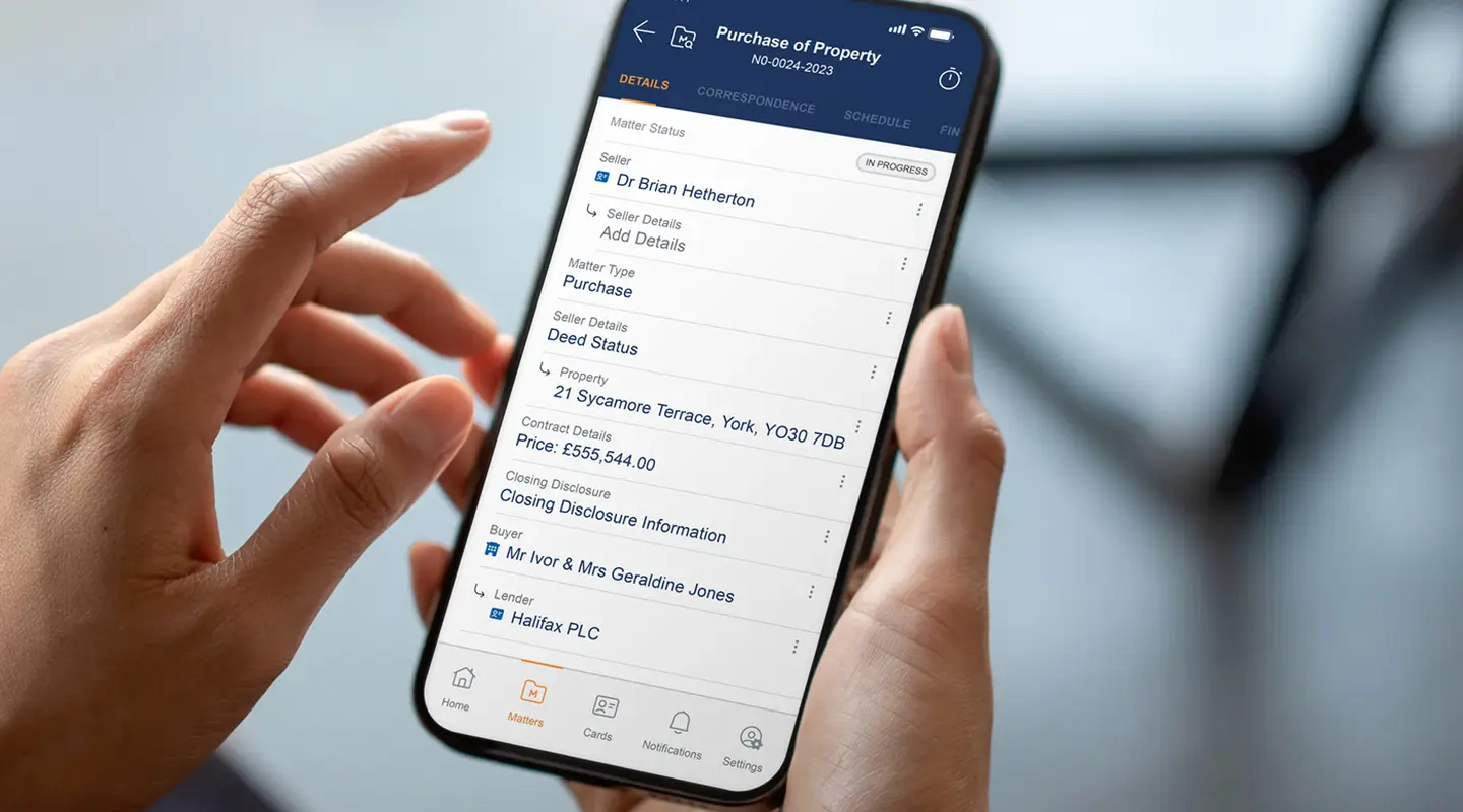 lawyer holding phone showing leap software matter details screen