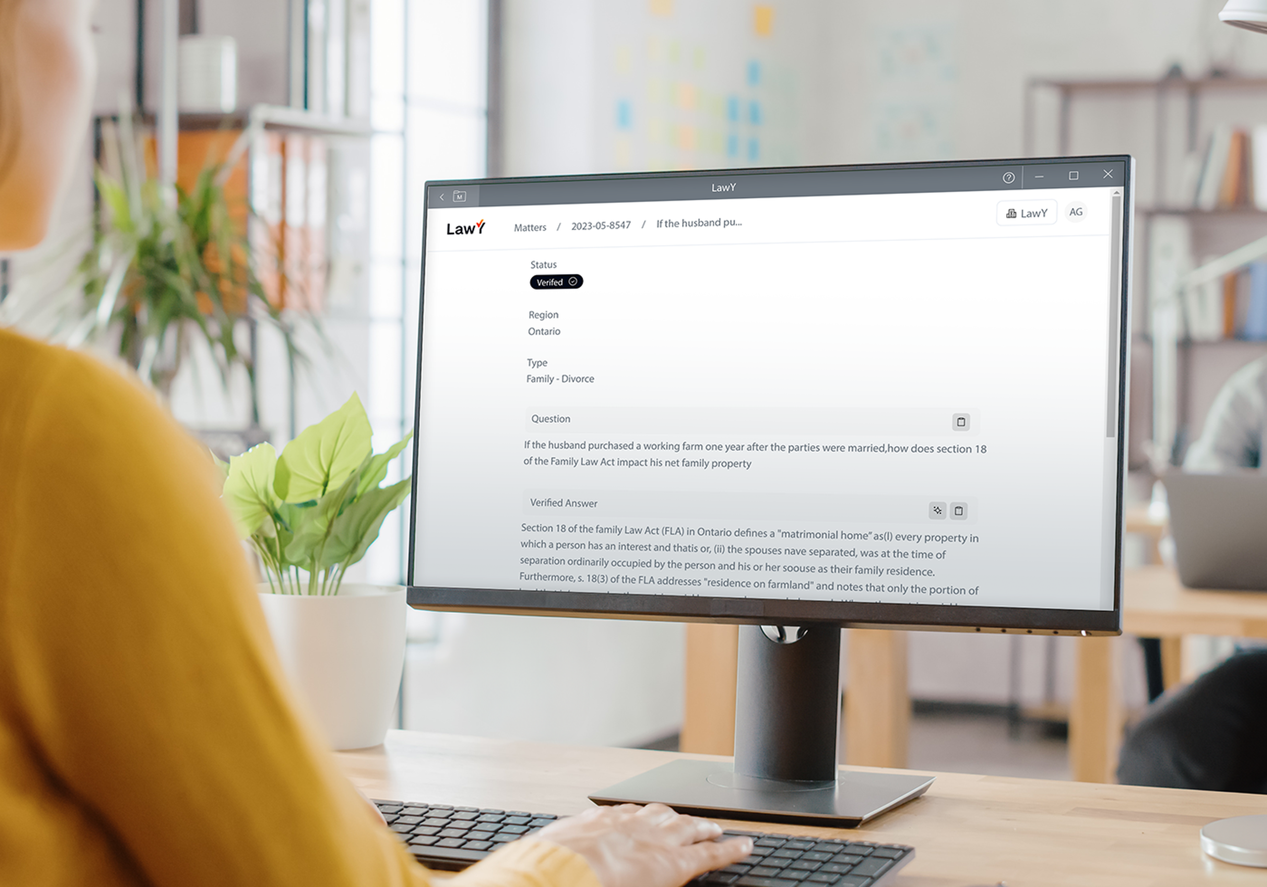 computer on a desk with LawY on screen