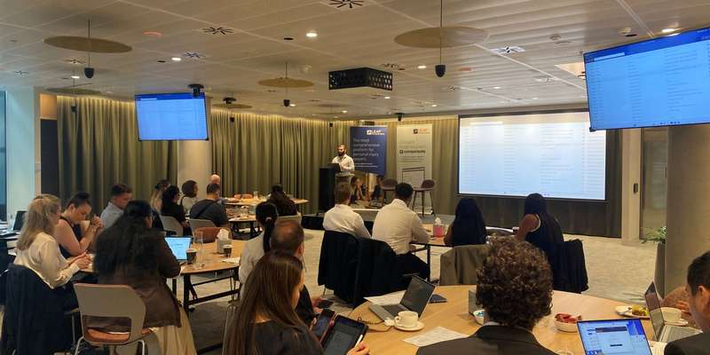 Personal Injury CPD event in Barangaroo with Aaron Sahin on stage speaking to an audience of LEAP Personal Injury clients in a community forum hosted by LEAP.