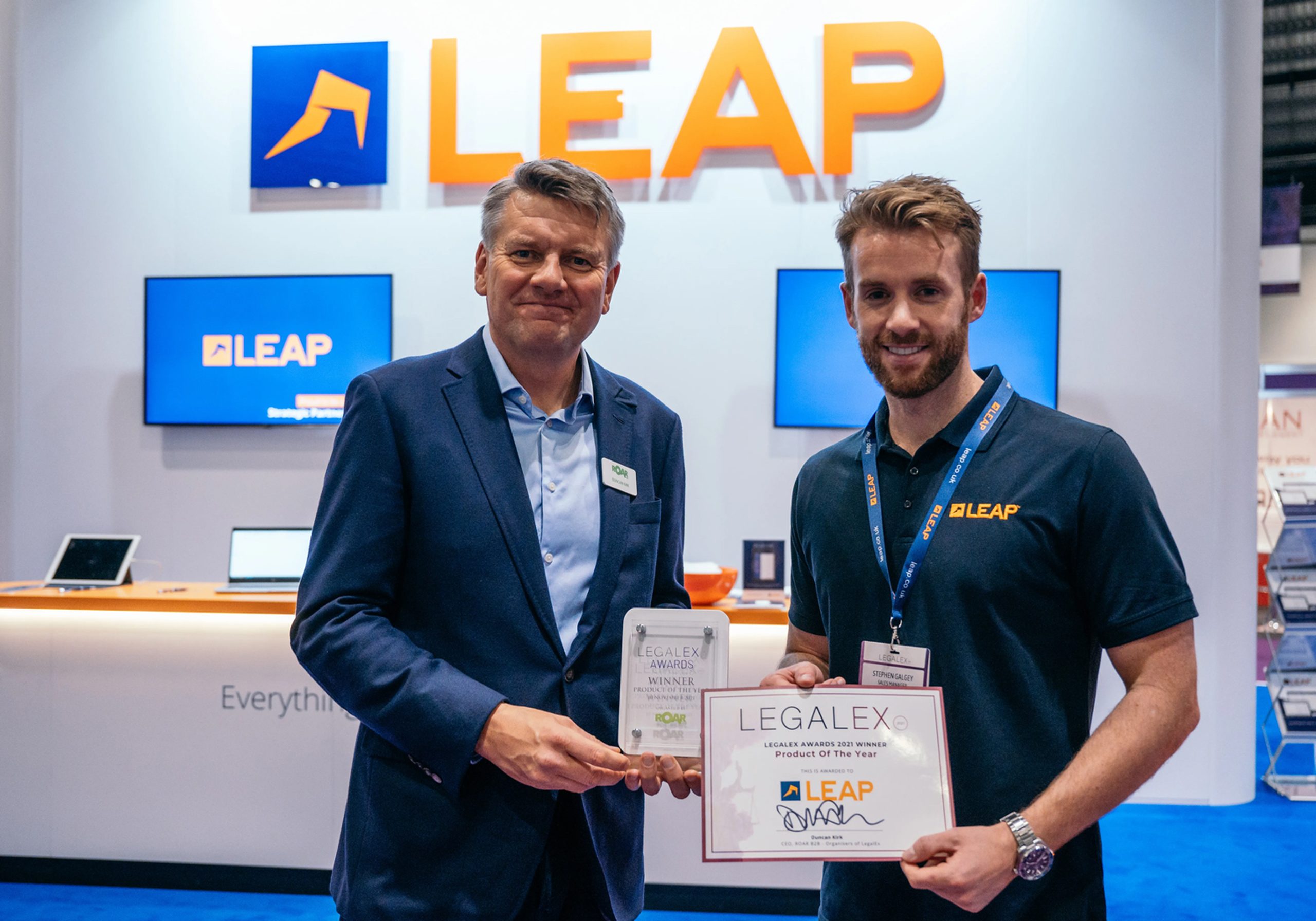 leap staff member receiving Legalex award