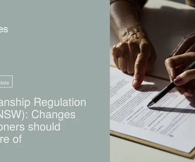 Hands reviewing a document with a pen on a clipboard. Text on the side reads: "Guardianship Regulation 2026 (NSW): Changes practitioners should be aware of."