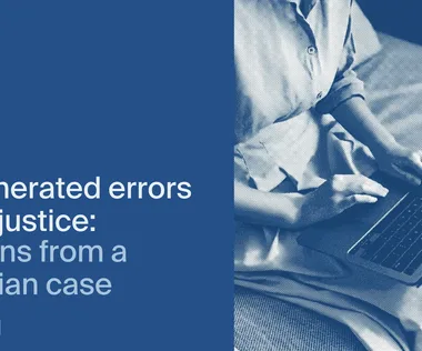 Person typing on a laptop; text reads “AI-generated errors delay justice: Lessons from a Victorian case” on a blue background.