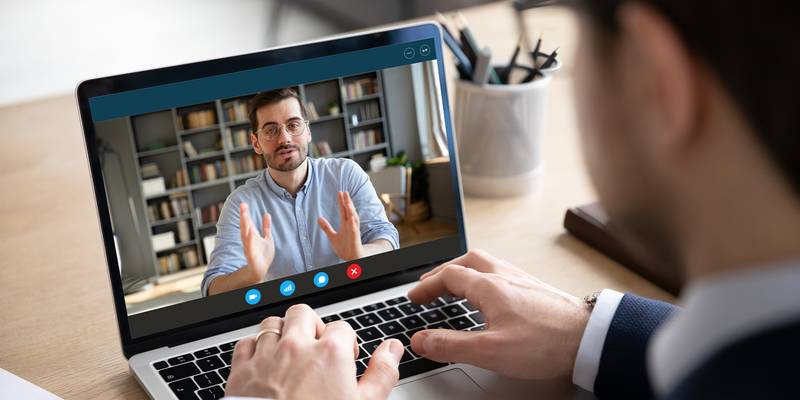 lawyer looking at laptop screen having a meeting
