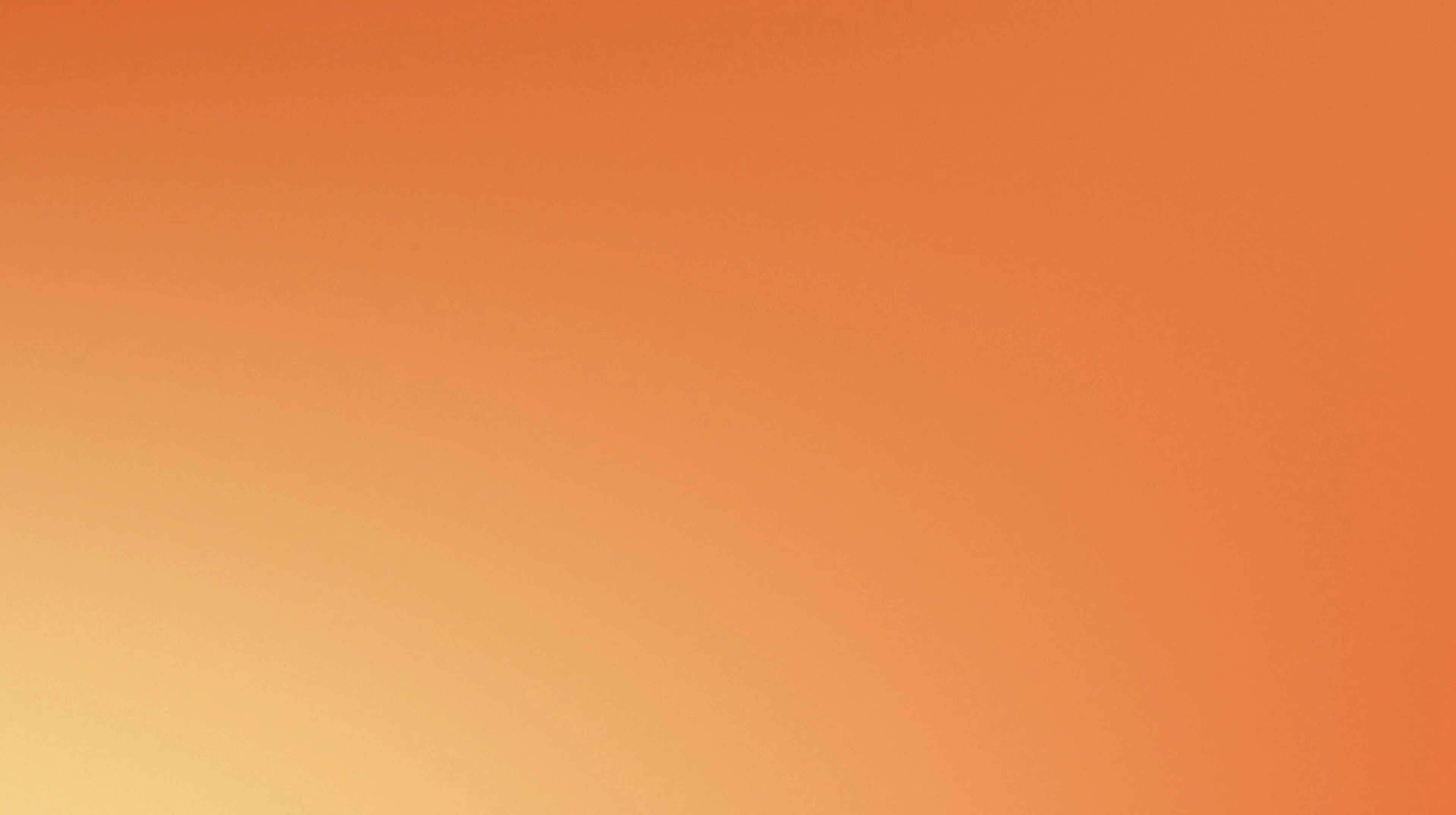 A smooth gradient background transitioning from light orange to darker orange.