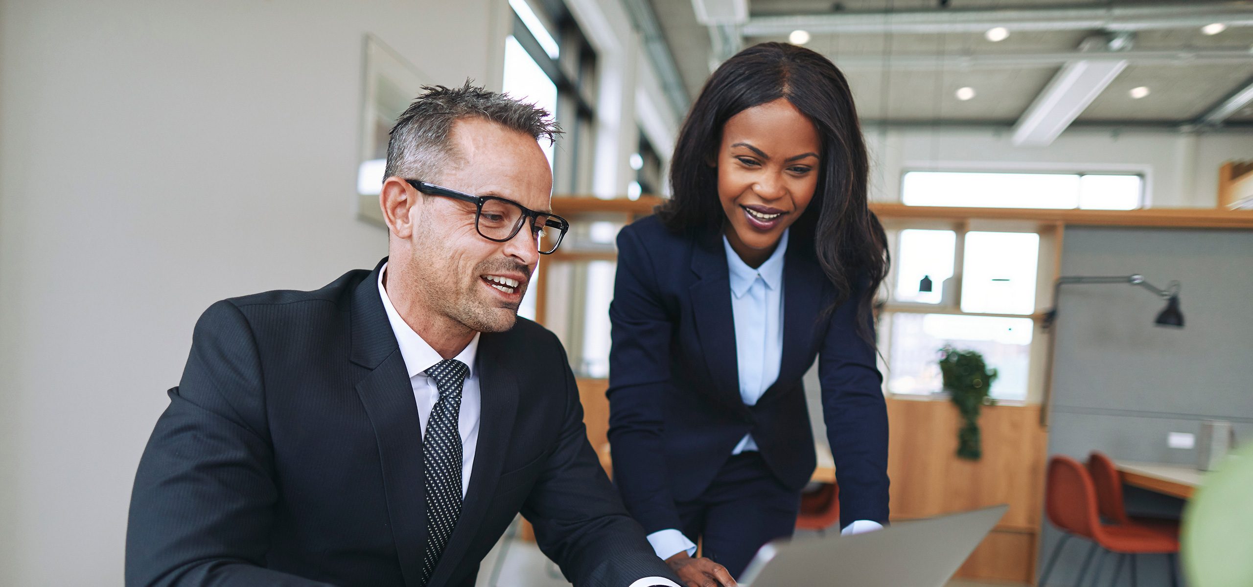 man woman meeting using laptop