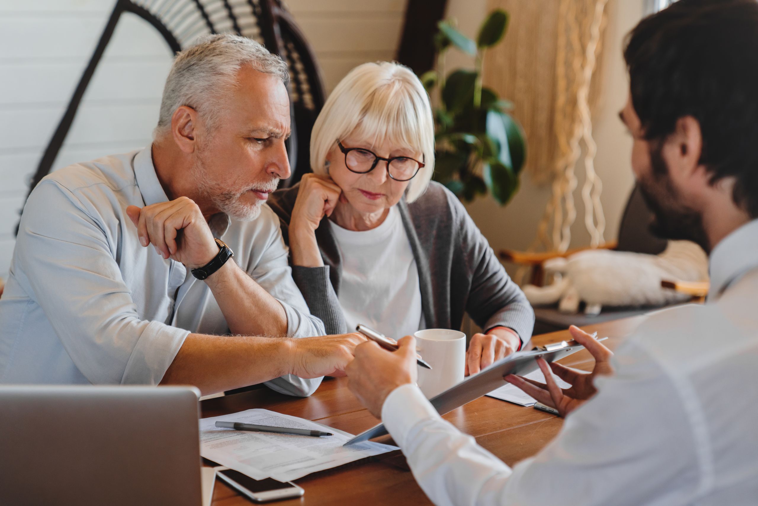 old man and woman reviewing documents