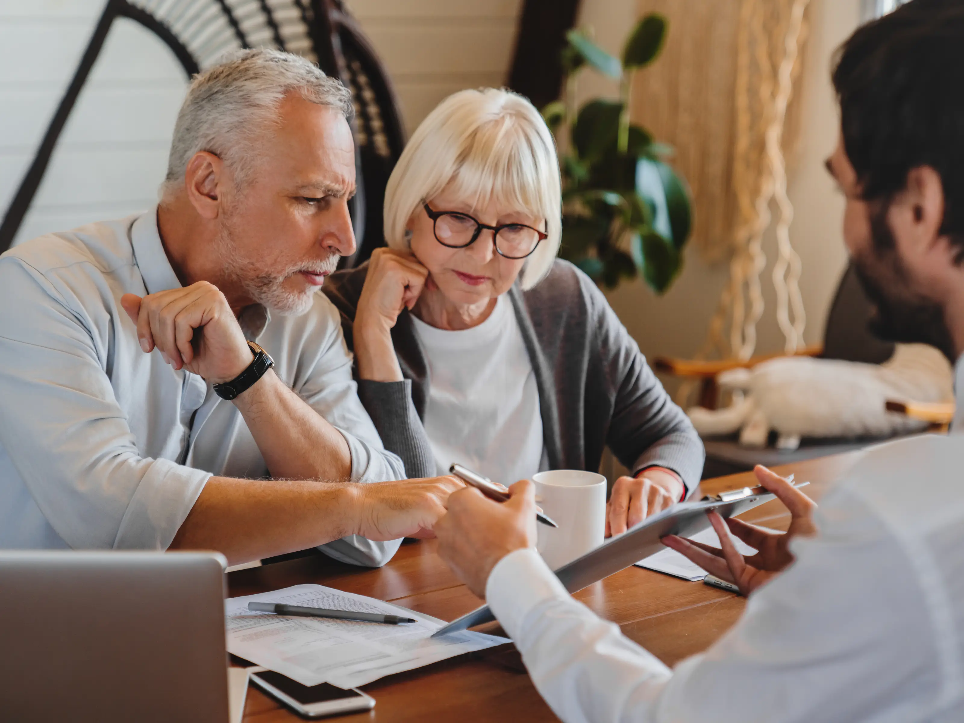 old man and woman reviewing documents