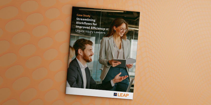 A man and woman discuss documents in an office setting. Cover text: "Case Study: Streamlining Workflows for Improved Efficiency at Legale Injury Lawyers."