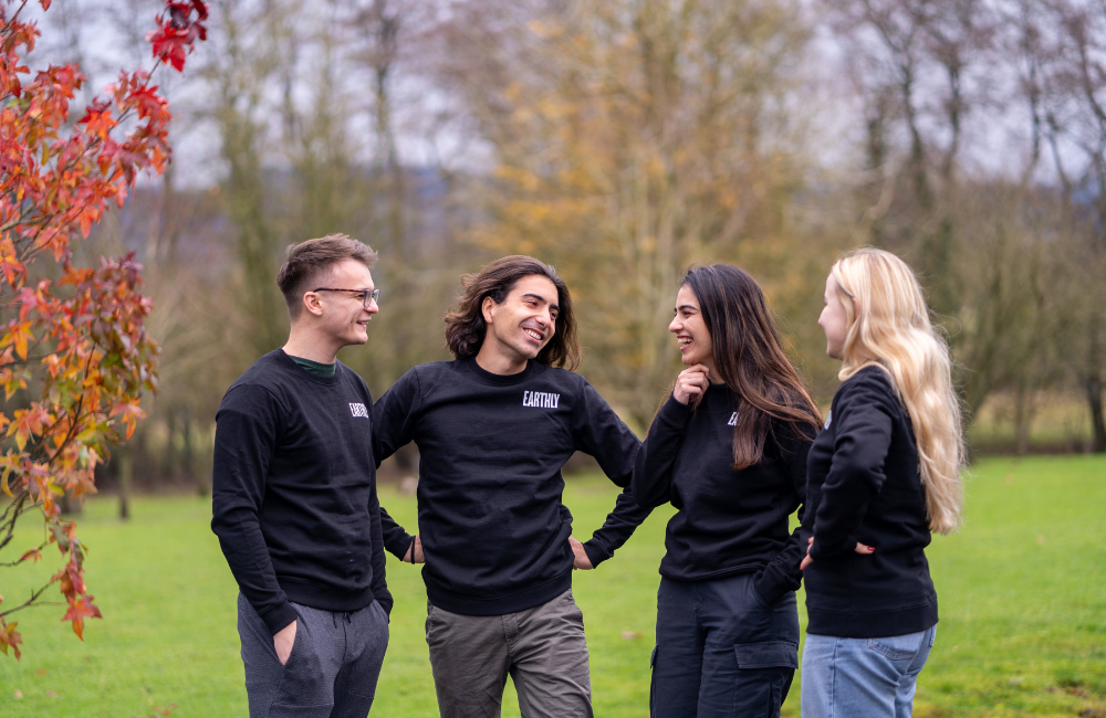 Earthly reearch team socializing aduring Earthly retreat in 2024