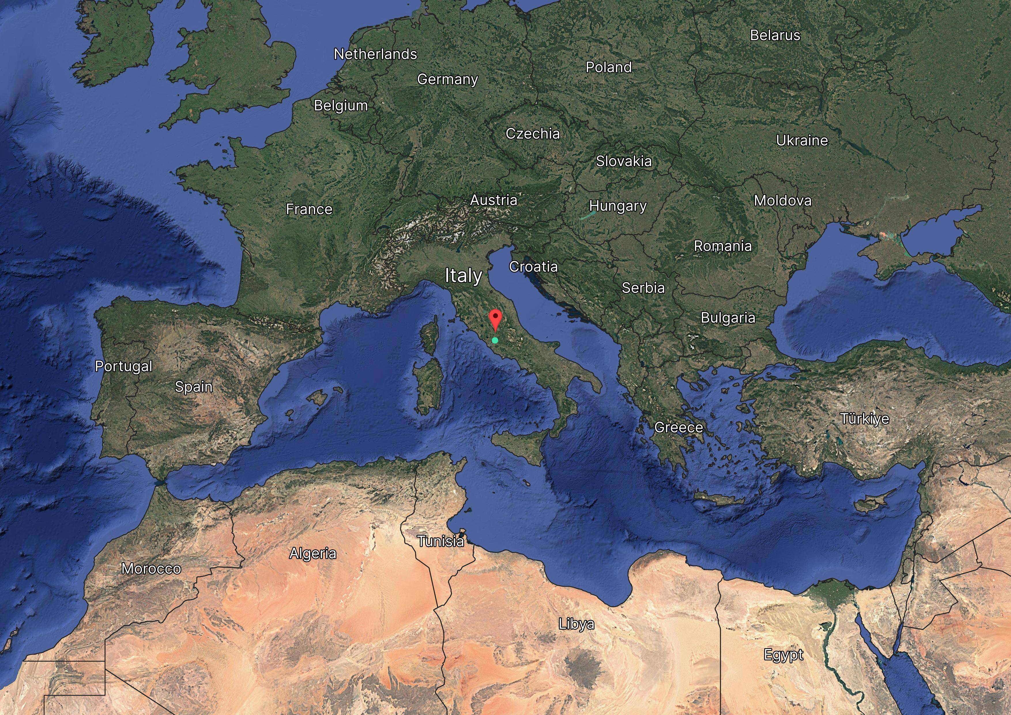 Satellite map view of Europe and North Africa, highlighting central Italy with a red marker.