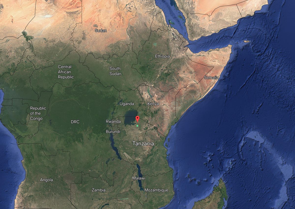 Map of East Africa showing countries like Sudan, Ethiopia, Kenya, Tanzania, and a red marker near Lake Victoria.