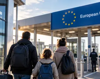 Family walking toward an EU border crossing, carrying backpacks, with a European Union sign overhead and an officer in the background.
