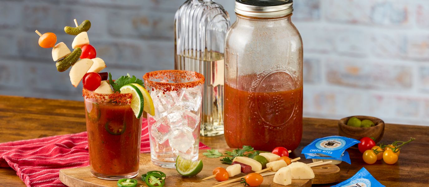 A Bloody Maria loaded with garnish, featuring first and foremost Sartori's Jalapeno Ranch Cheese Bites