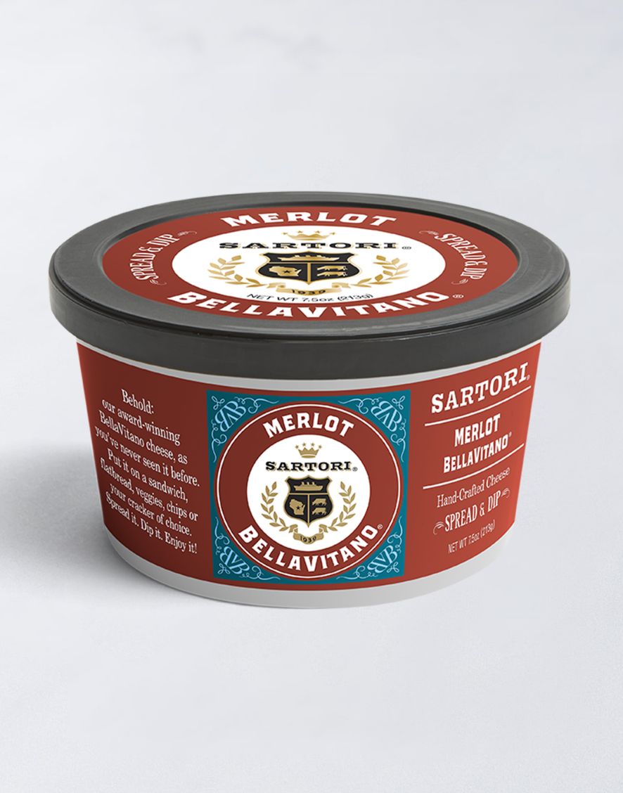 Round container of Sartori Merlot BellaVitano cheese spread with a red and blue label, featuring the brand logo and product details.