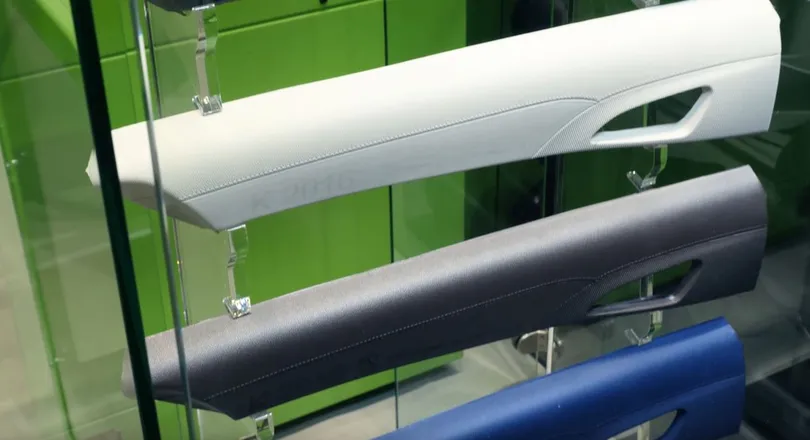 Video shows door interior trim with in-mold graining