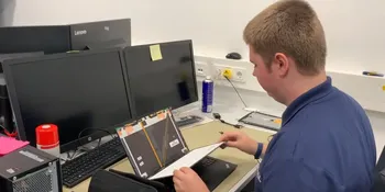 Graphic shows apprentice in information technology 