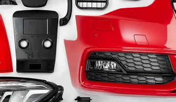 Picture shows automotive injection moulding application from ENGEL