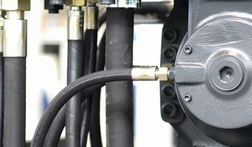 Picture shows hydraulic hose of an injection moulding machine from ENGEL