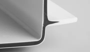 Picture shows cross-section of a plastic component with recycled content