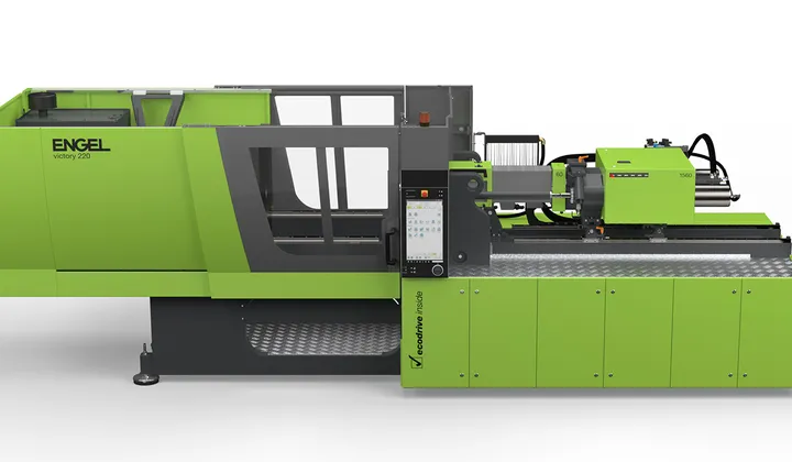 Picture shows tie-bar-less injection moulding machine from ENGEL