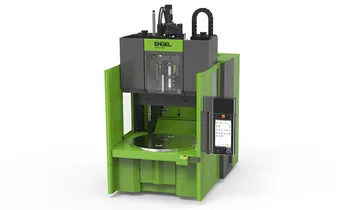 Picture shows vertical injection moulding machine from ENGEL