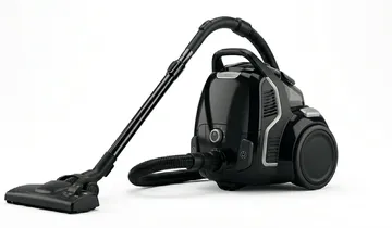 Image shows a black vacuum cleaner with plastic components