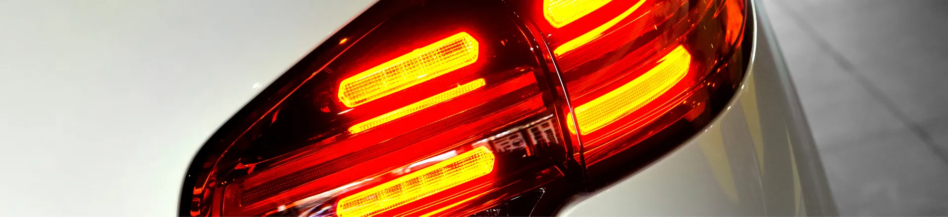 Image shows optical plastic parts for the automotive industry