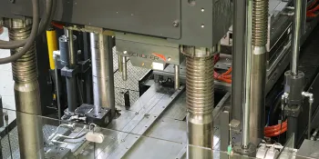 Picture shows closing side of vertical injection moulding machine