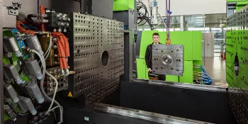 Picture shows employees doing a fast mold change