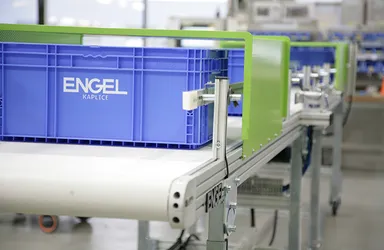 Image shows box transfer systems from ENGEL