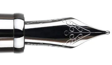 Figure shows fountain pen nib manufactured using PIM injection moulding process