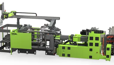 L’image montre une presse à injecter duo 900 d’ENGEL équipée du two-stage-process permettant l’économie circulaire