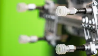 Close-up of vacuum suction cups on a robot gripper